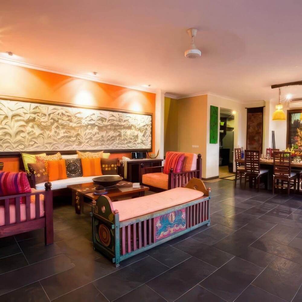 The living room with Balinese limestone carvings and custom furniture